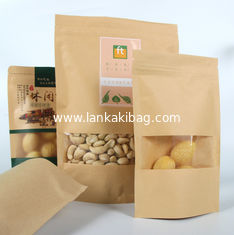 China Stand up kraft k paper bag with clear window for cookies and nuts packing supplier