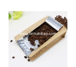 China Coffee 100g resealable zipper stand up foil lined kraft paper coffee bag with valve supplier